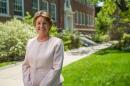 Portrait of Michele Dillon outside of a campus building